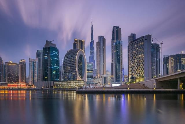 Dubai Downtown Skyline with Blue light